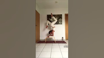 Practicing Advanced Yoga On Headstand Bench 🤍