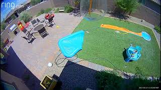 Gust of wind blows inflatable pool and knocks over little boy