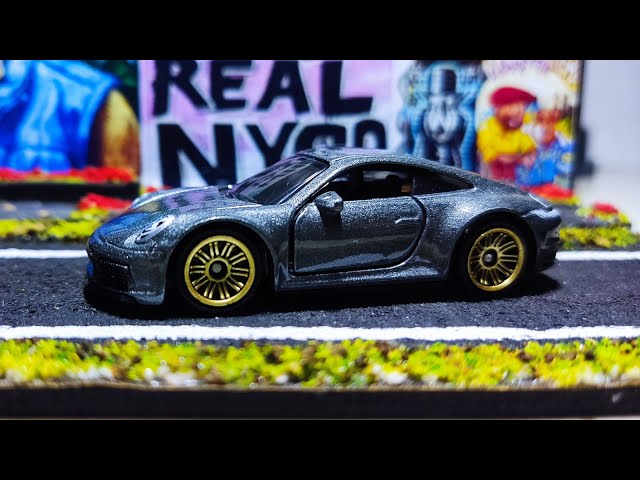 Matchbox Moving Parts - Porsche 911 Carrera 4S 2023 - Modèle Réduit 1:64 Bleu - Neuf Dans Sa Boîte