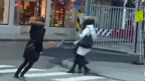 Walkin  in the Wind  People blown over in streets as Storm I