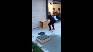 Teen girl falls over box after failed jump