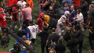 girl on sideline gets run over during Ohio State vs Georgia game screenshot 3