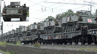 British armoured vehicles arrive by train in Germany