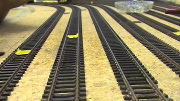 Model soldering feeder wire to track