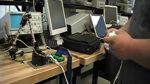 robot arm student hacks Wii game controllers to use accelorometers to control a robot arm