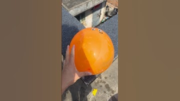Experiment: Will a water balloon explode if it rolls down a tall building? 💥🎈 #balloon