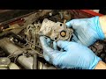 Removing idle speed air distributor  adjuster and warmup compensator
