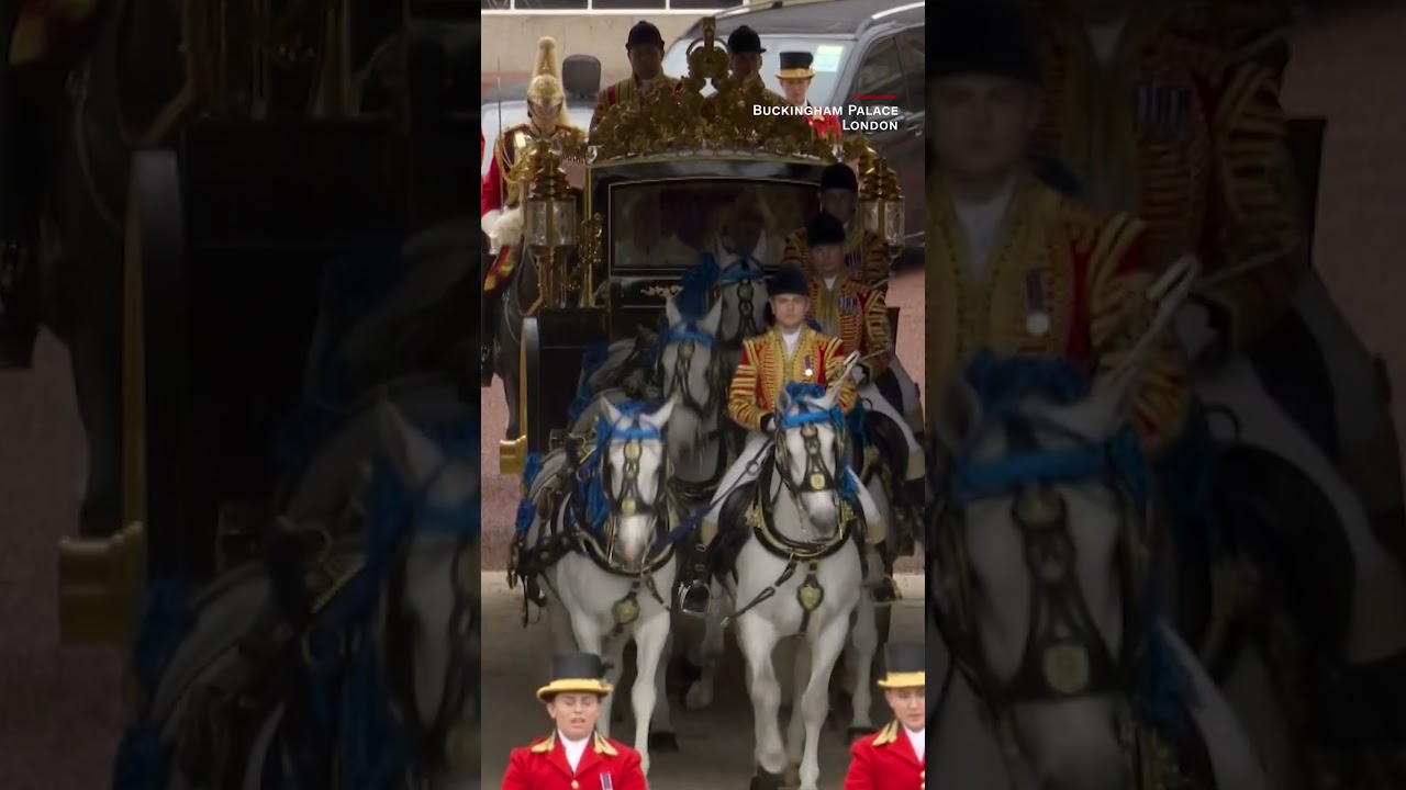 ⁣King Charles and Queen Camilla set off in coach to coronation