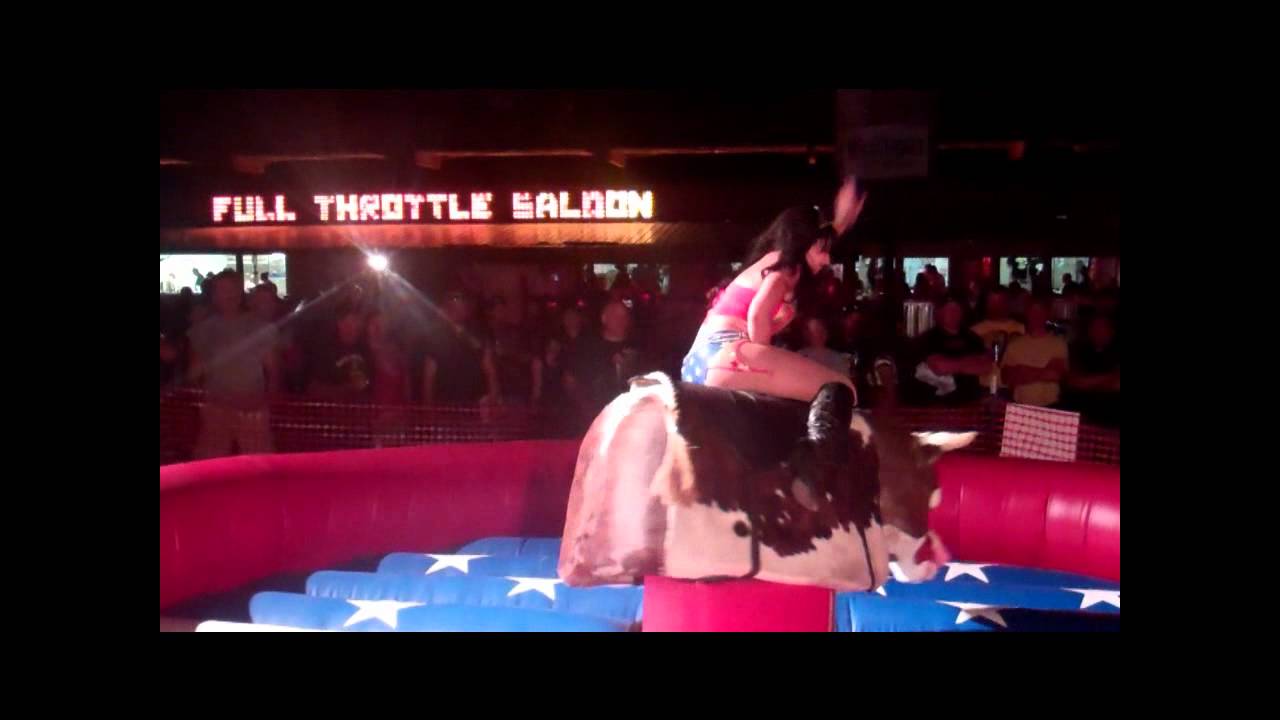 A woman rides the mechanical bull in the Full Throttle 