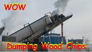 18 wheeler dumping wood chips