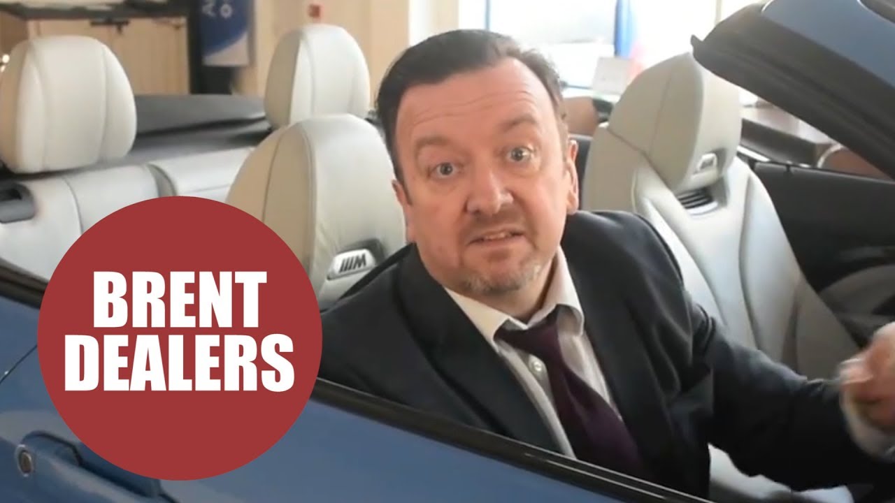 Used car dealership hire professional Ricky Gervais impersonator to
