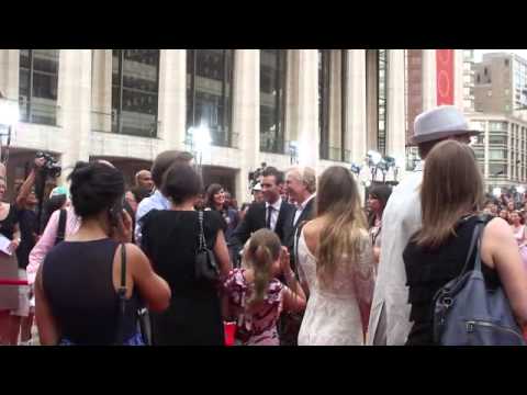 Alan Rickman and Matthew Lewis walk by at premiere...