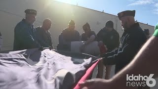 American Legion members retire damaged flags from Cloverdale overpass
