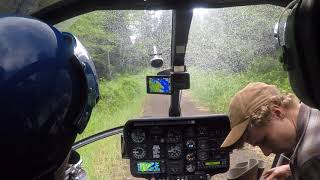 Flying Alaska MD520N Crew pick in the trees