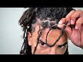 How to interlock dreadlocks