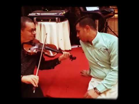 اما براوة نجاة عازف الكمان يحى المصرى