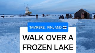 Walking Over A Frozen Lake in Tampere, Finland