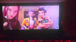 Dressed as Jinu at Kpop Demon hunters sing along in theaters for Halloween.