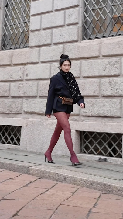 The girl walking down the street! #fashion #streetstyle #shorts #shortvideo #fyp #reels #nylon