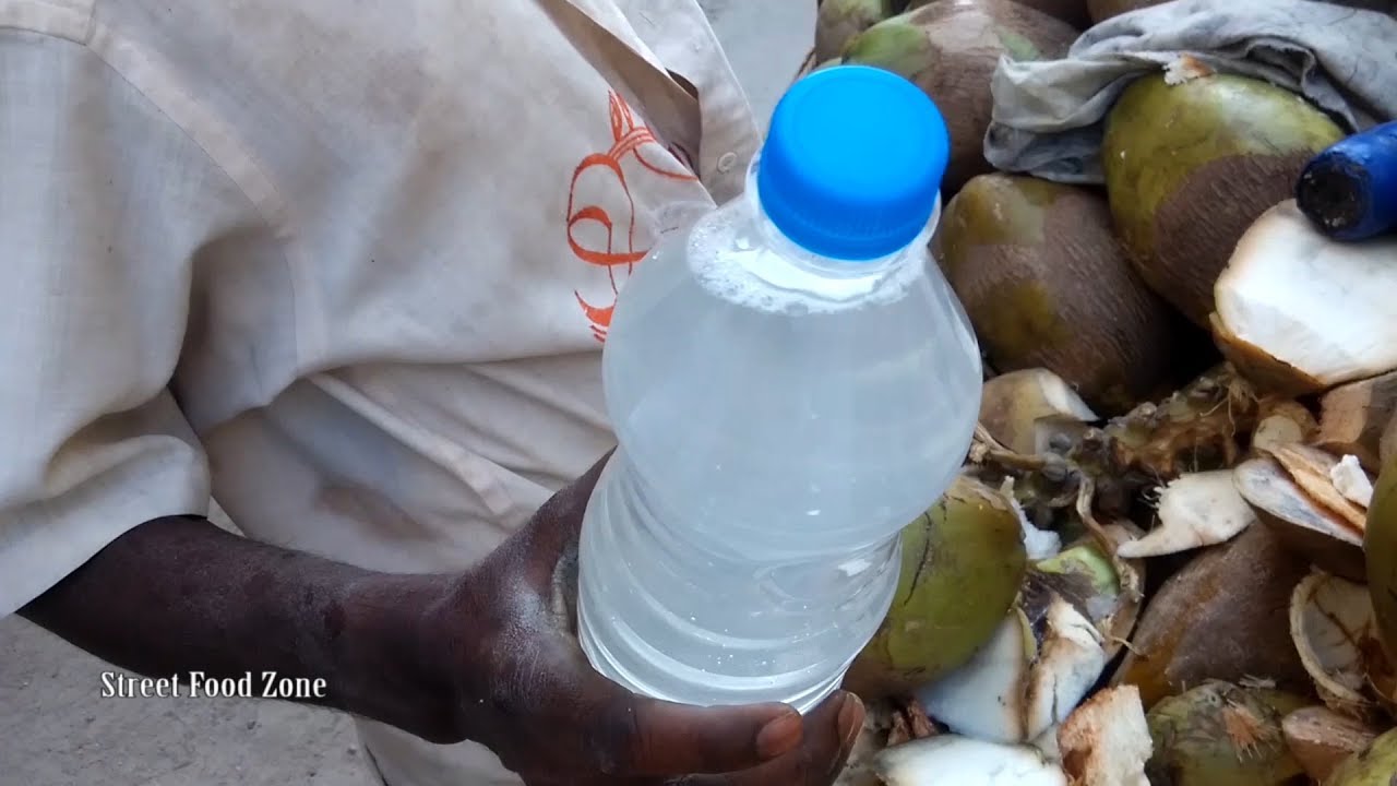 Coconut Vendor Filling Bottle with Coconut Water | Healthy Natural Drink | Coconut Cutting Skills | Street Food Zone