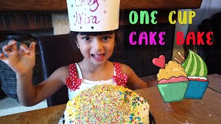 Akira bakes and decorates her first one cup cake with sweet icing, sparkle flakes and a big smile screenshot 4