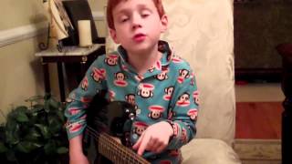 Kyle reading music and playing Two String Rock