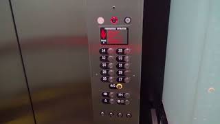 Misleading Elevators: Otis Series 2s with Schindler Indicators & Chimes at 1670 Broadway, Denver, CO