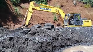 heavy equipment operator attempts to dredge sand containing small stones - andhry ex