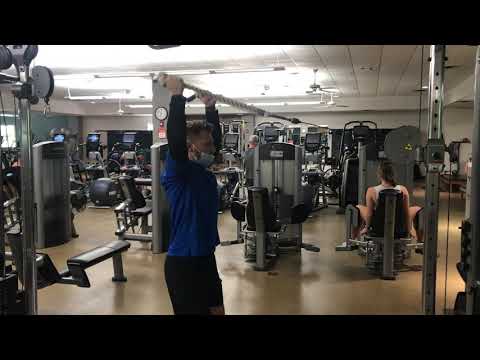 Overhead Shoulder Press Cable Rope in a External Rotation Isometric Hold