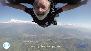 My 65 year old dad skydiving over the Himalayas