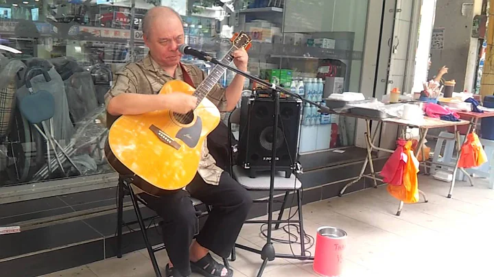 Blind musician Albert Ho performs Elvis Presley's ...