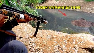 Shocking... //River dweller emerges from its lair during a tilapia strike