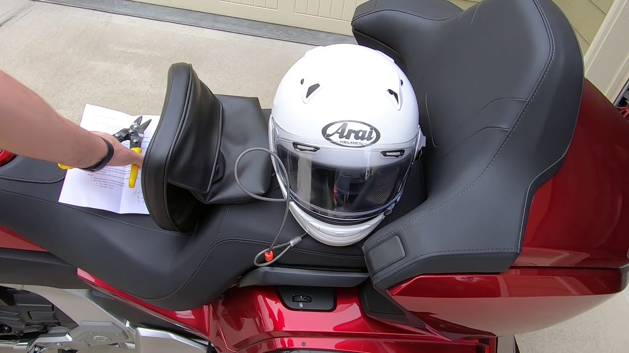 What is the best way to secure a helmet to a motorcycle? - YouTube