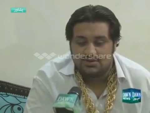 A Man wearing 250 tola gold all the 