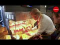 Donald Trump serves fries at McDonald's