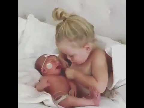 Baby sister try to  breastfeeding her younger brother 😍💕😘 Funny #siblings #babies #shorts