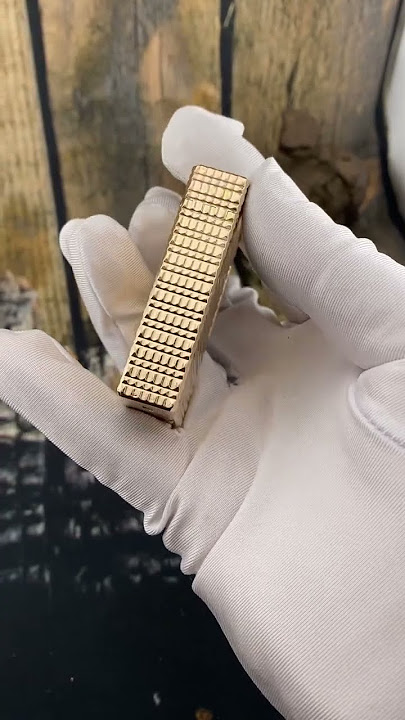 S.T Dupont one hole high form, gold diamond pattern warranty.