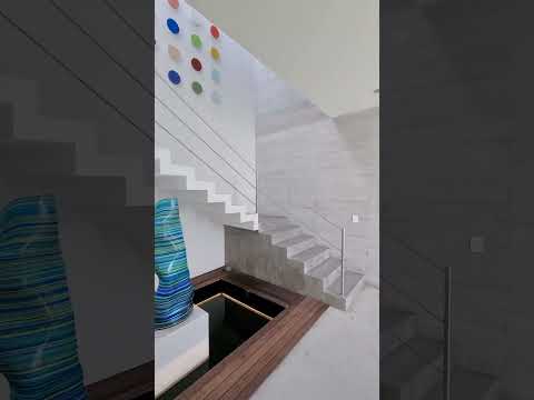 Video: Casa contemporánea de hormigón con increíbles interiores en Nueva Zelanda