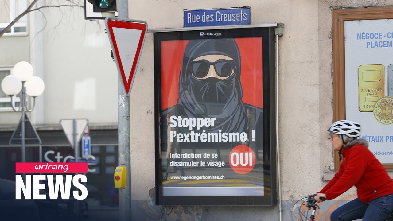 Запретить лицо. French ban on face covering.