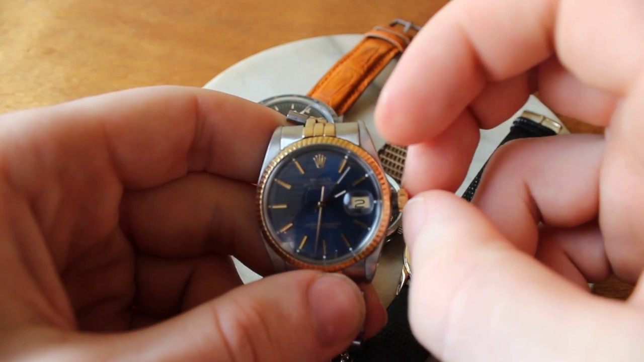 How to wind & set time on a Rolex - YouTube