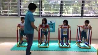 Singapore pre-schoolers work out in indoor play area