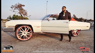 Pearl White 73 Cadillac Deville on 28' Artis Wheels