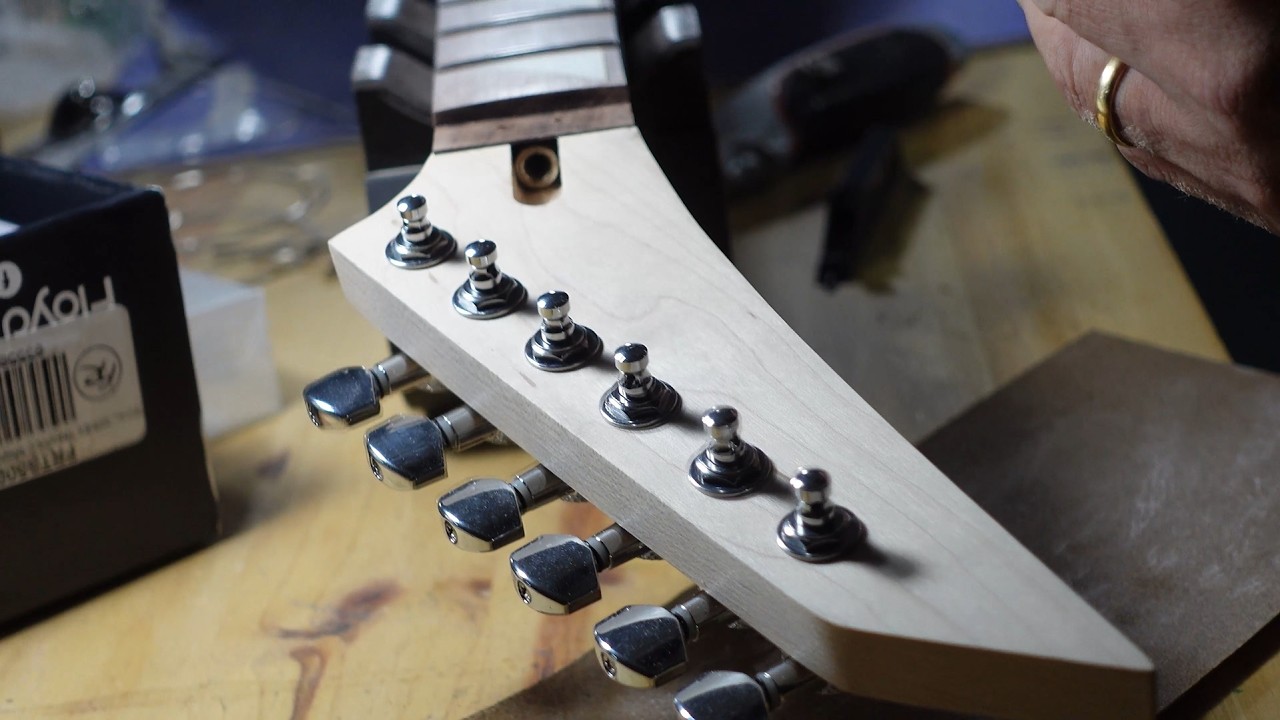 TELESCASTER, VIOLÕES E DARDOS...