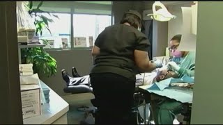 Lawmakers push to restore MassHealth dental coverage