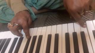My Guru Sri Deepak Roy playing key board.