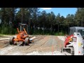 Grader Rowing Up Dirt