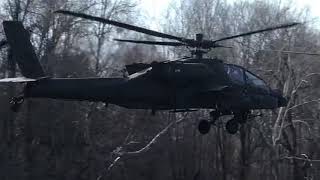 North Carolina National Guard Boeing AH-64 Apache helicopter flying over the Cape Fear River