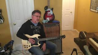 Epiphone SG 2009 g-310 vintage white finish.  Thru a mesa
