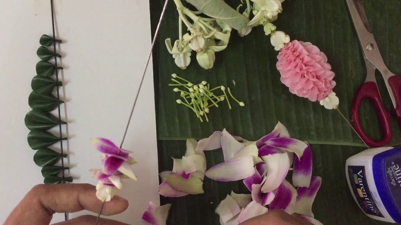 การร้อยมาลัยตุ้มแบบง่ายๆ(ด้วยกลีบกล้วยไม้)