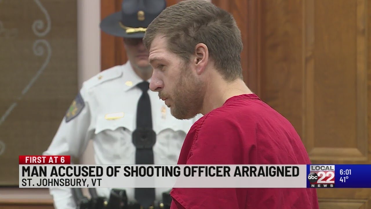 Man accused of shooting police officer pleads not guilty - YouTube